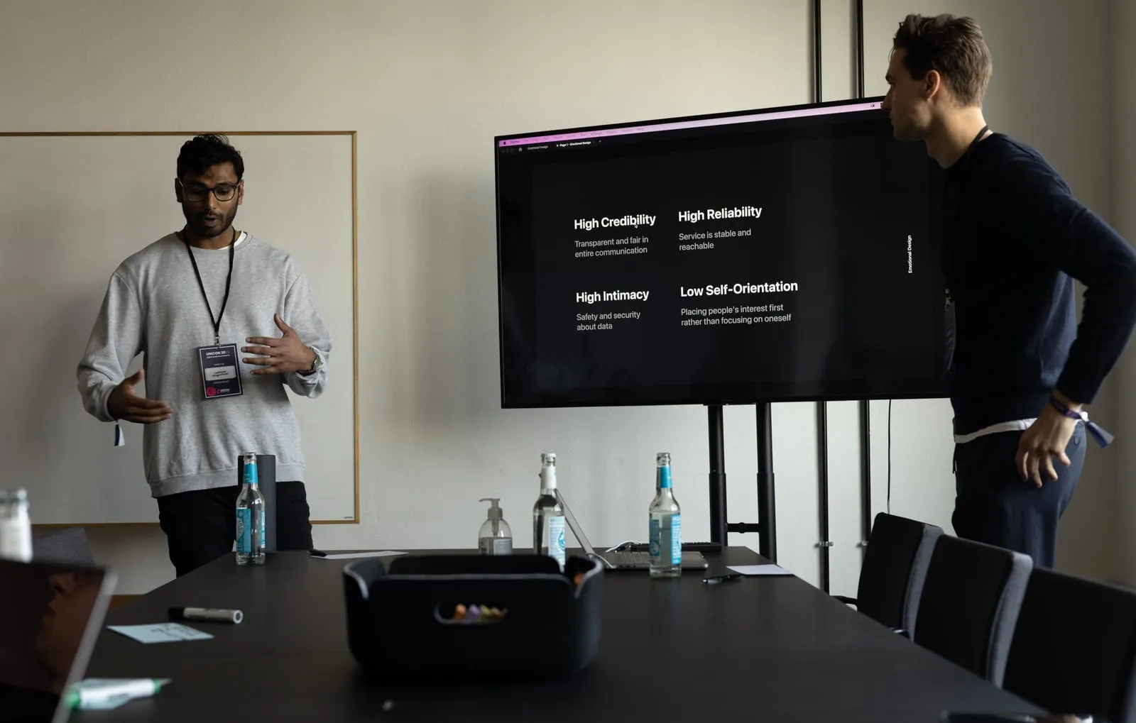 Presenting a slide on trust to a room